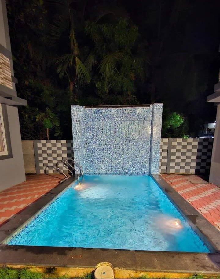 Pool lit up at night